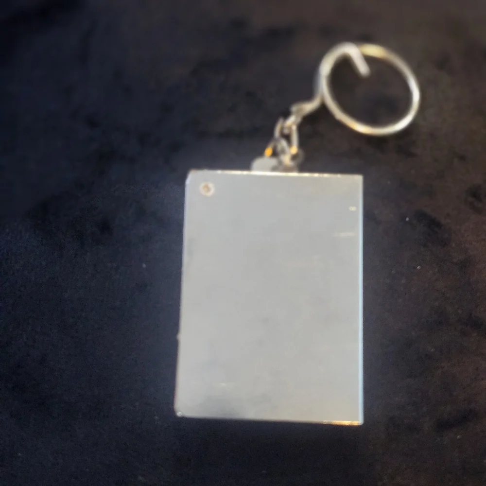 Saint Jude Thaddeus keychain Silver metal And Plast Gold Top design.